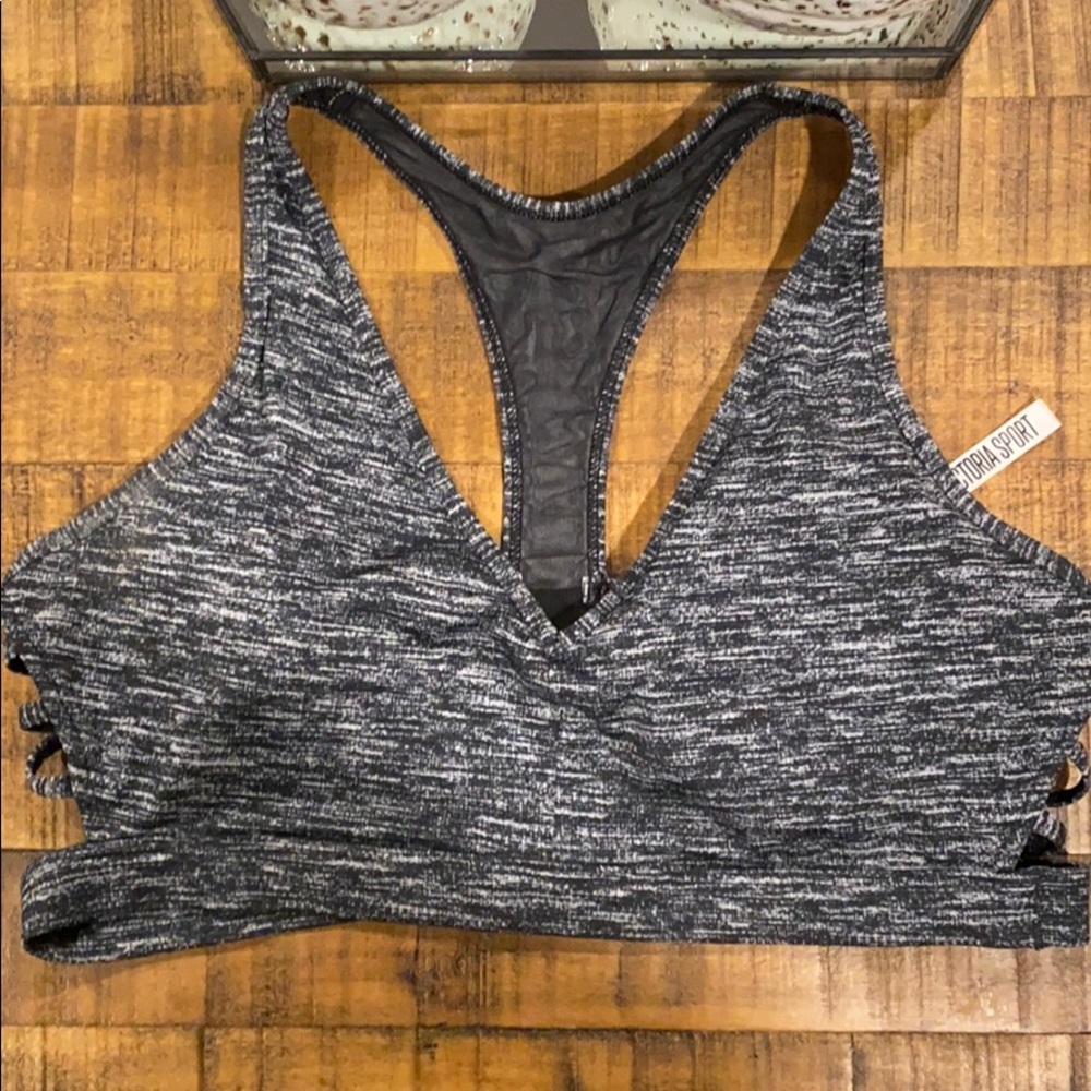 Victoria’s Secret sports bra size large.